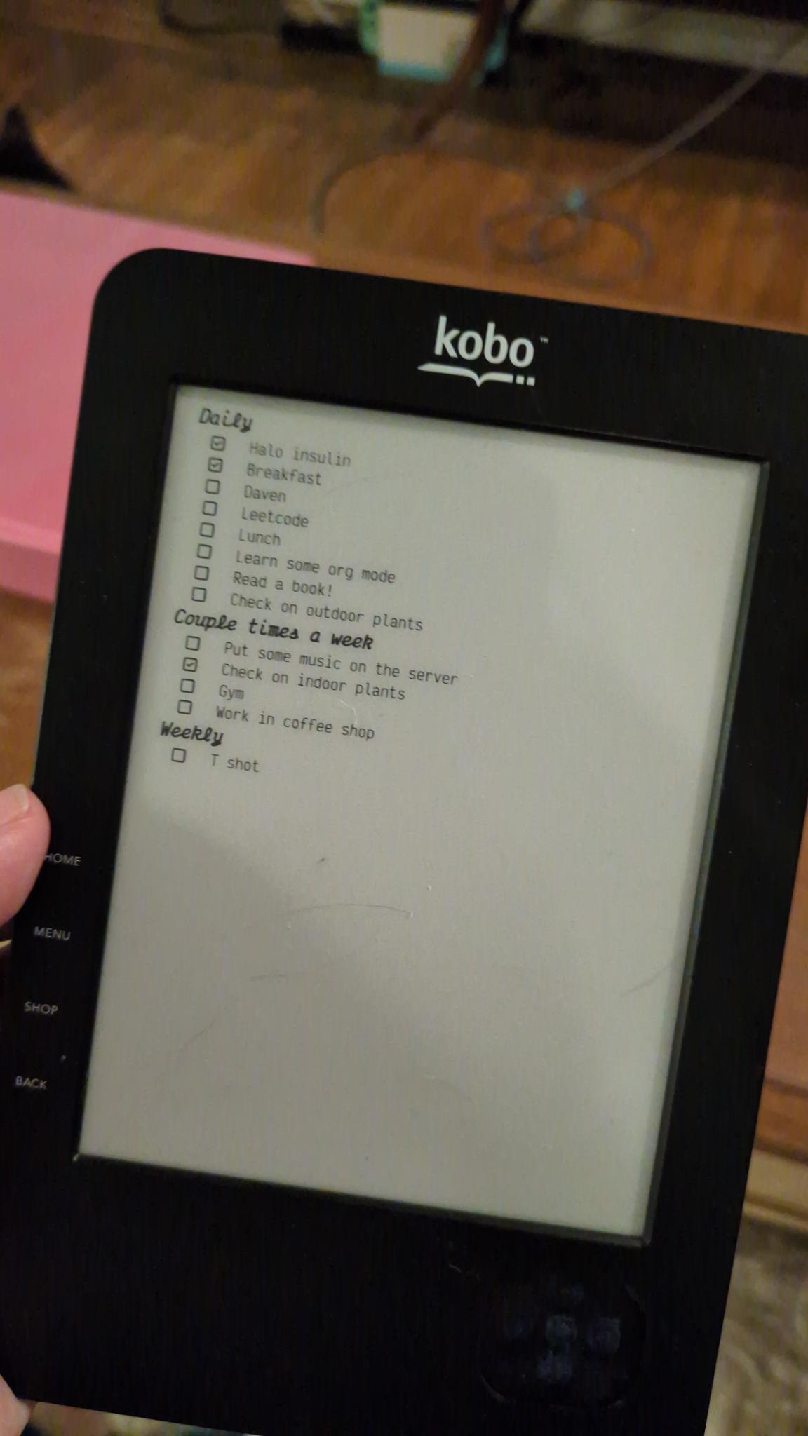 picture of a souped up 2011 kobo ereader displaying a basic todo application